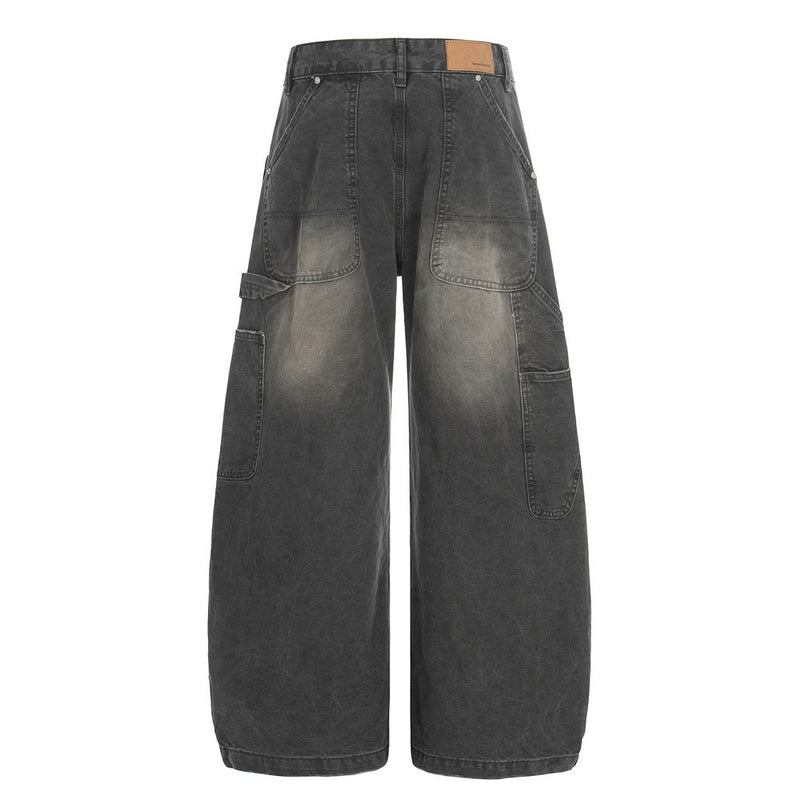 Wasteland-Inspired Distressed Patchwork Wide-Leg Denim Trousers